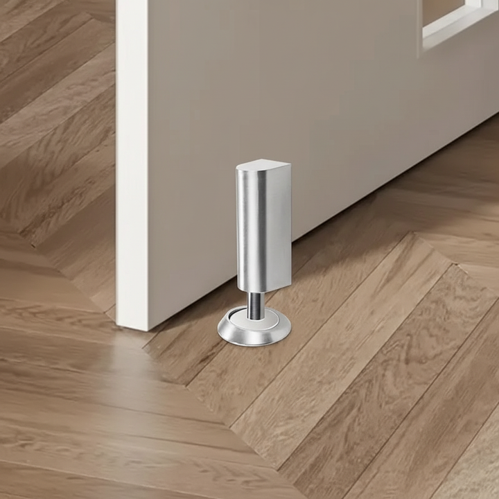 Close-up of SilentGrip magnetic floor door stopper, showing strong magnet, anti-slam home hardware.