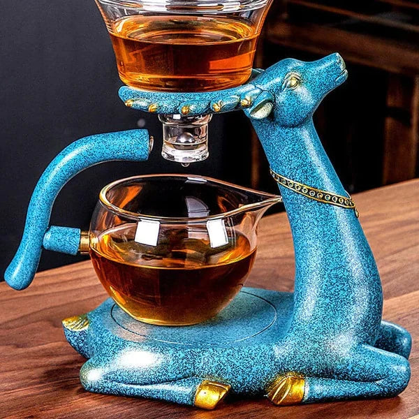 Innovative magnetic tea set with automatic water injection system & glass teapot for perfect brewing.
