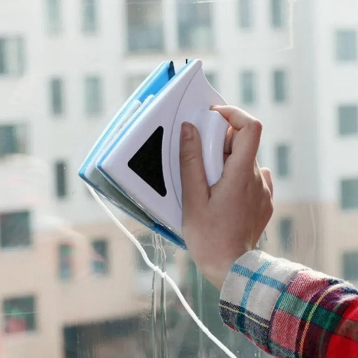 Powerful magnetic window cleaner achieving sparkling, streak-free glass on any window.
