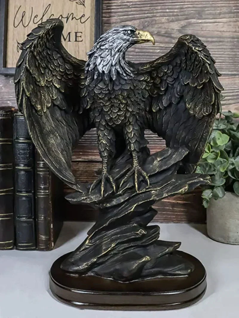 Majestic bronze eagle statue, a detailed animal sculpture perfect for luxurious home or office decor.