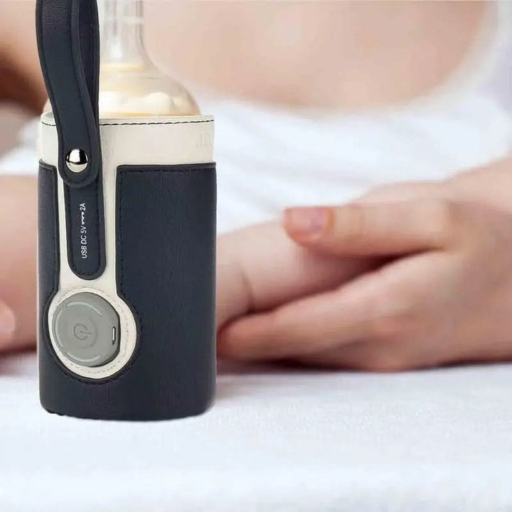 Travel-friendly MAMAGO PRO portable bottle warmer for baby feeding; USB charged, perfect for on-the-go parents.