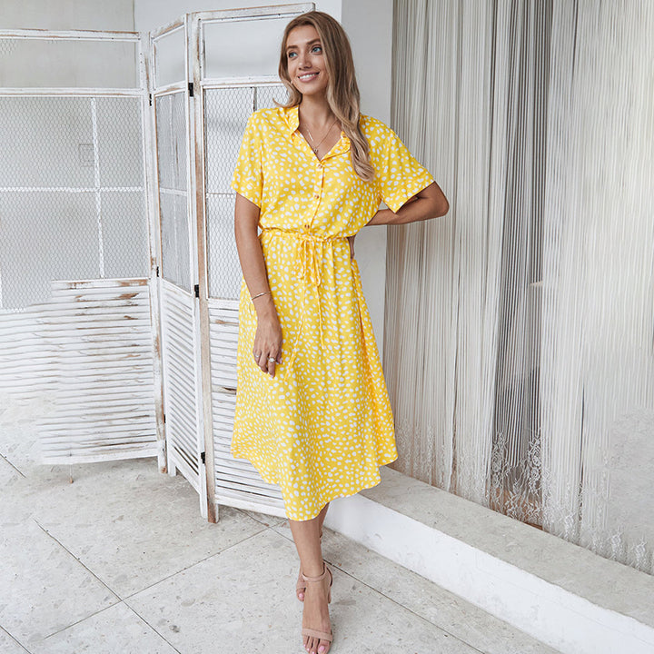 Detailed pattern of the printed V-neck A-line midi dress, a stylish women's dress