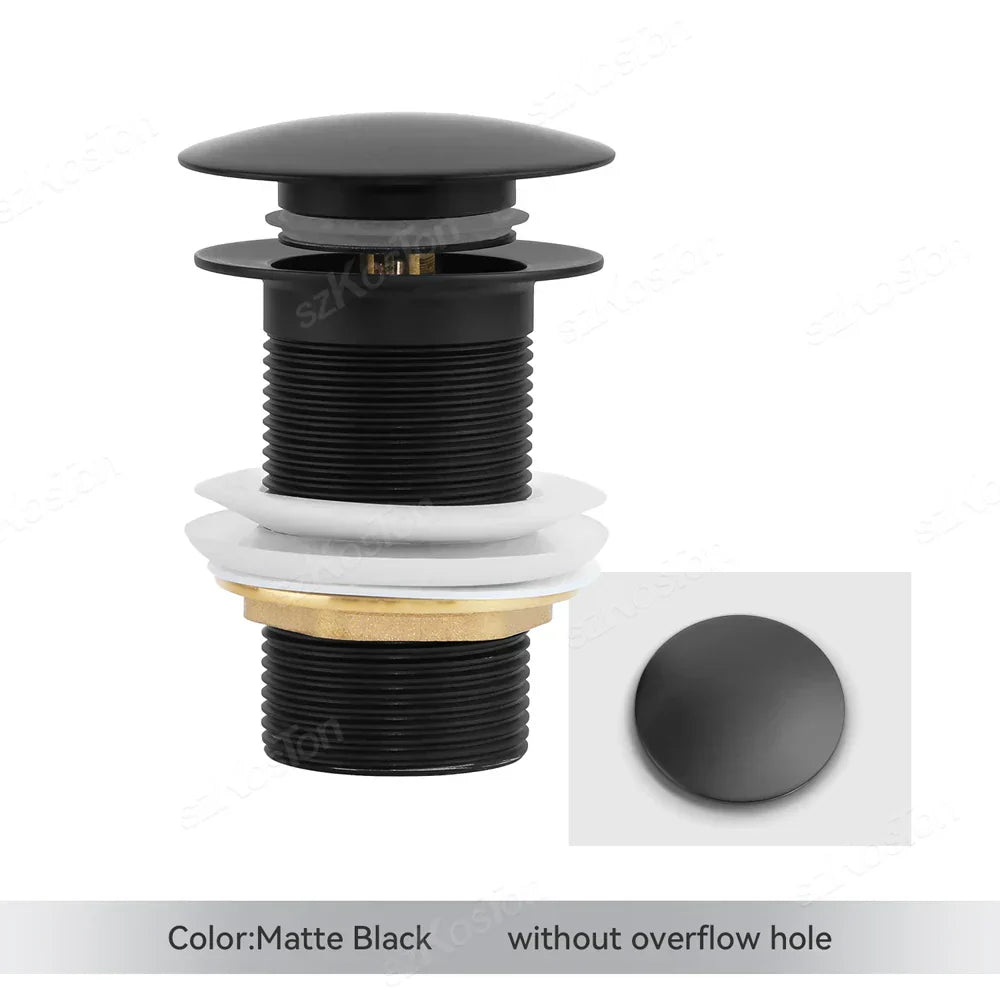 Close-up of a brushed gold pop-up basin drain plug mechanism with overflow function