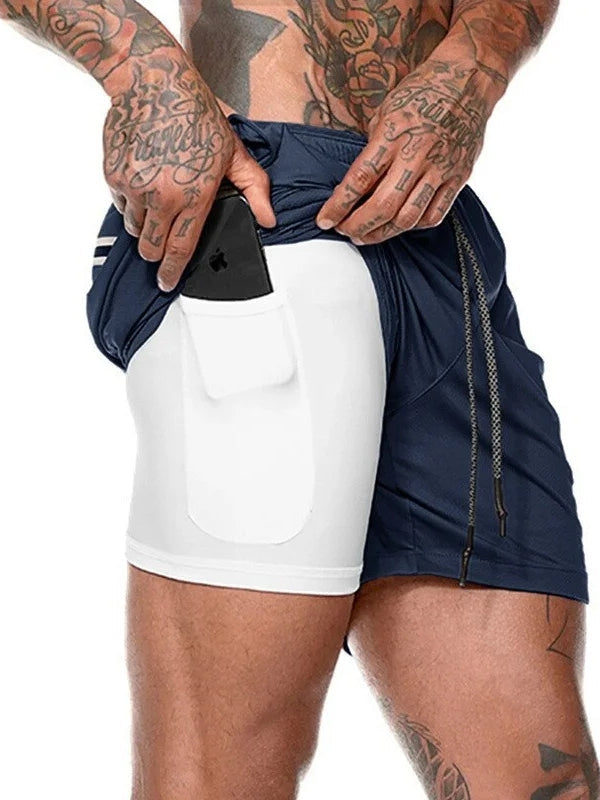 Active man wearing Felix 2-in-1 athletic shorts while jogging in a park.