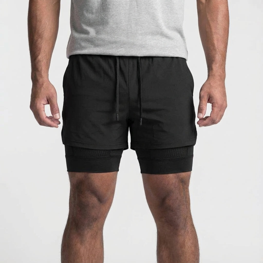 Rear view of men's black 2-in-1 training shorts, accentuating comfortable fit.