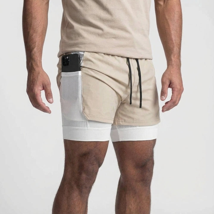 Black 2-in-1 workout bottoms for men, perfect for various athletic activities.