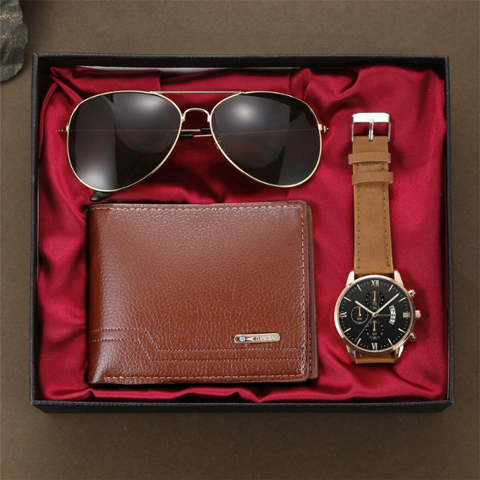 Curated men's gift set featuring a classic watch, sleek aviator sunglasses, and a premium leather wallet.