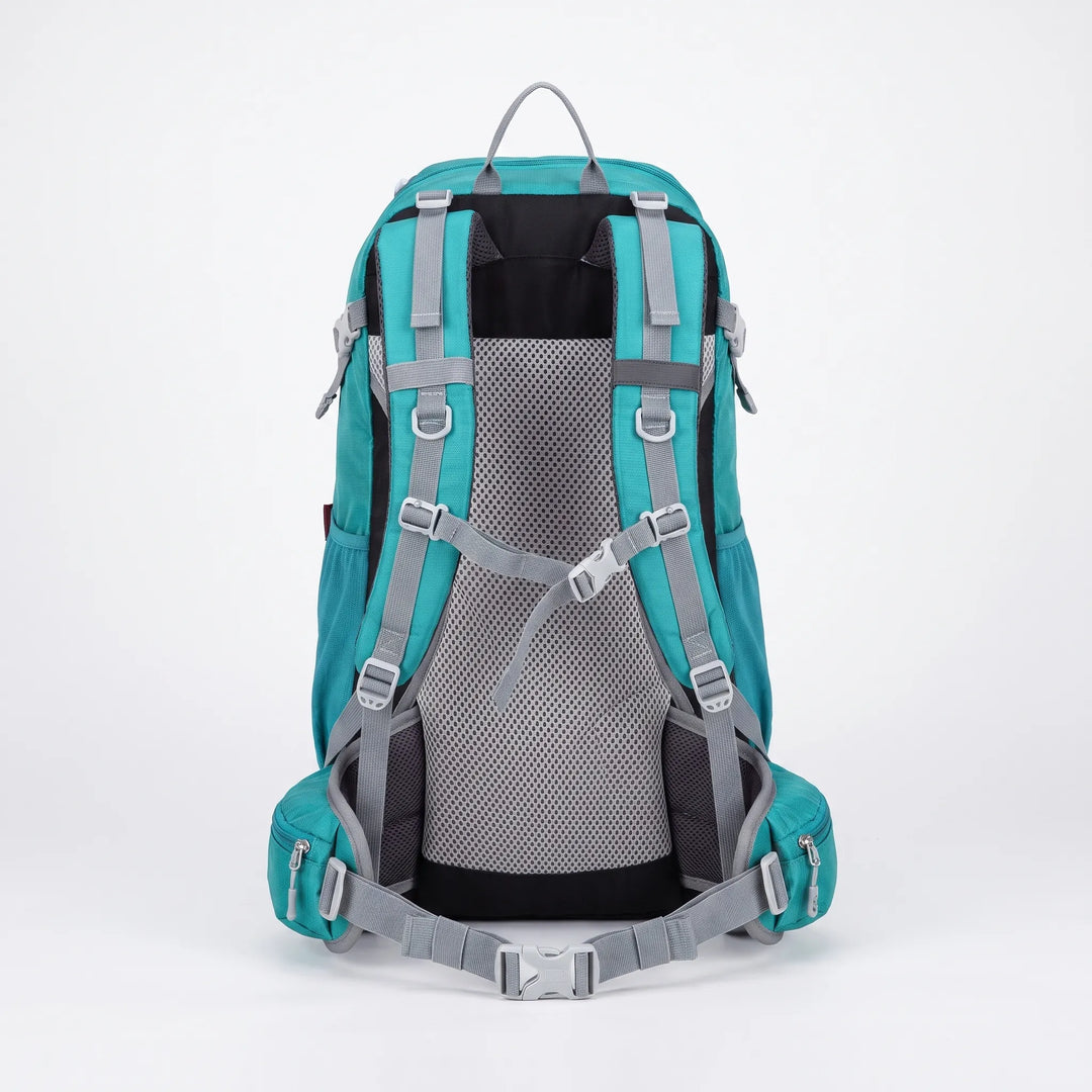 Man on a scenic trail wearing a 7.9 Gallon ventilated men's hiking backpack for outdoor adventures.