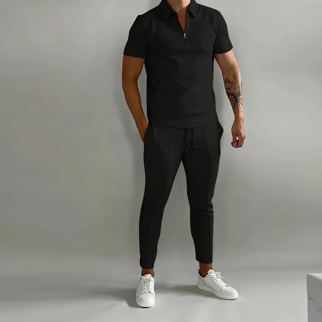 Comfortable men's sporty training outfit for active lifestyles. Ideal gym wear, made of durable polyester athletic fabric.