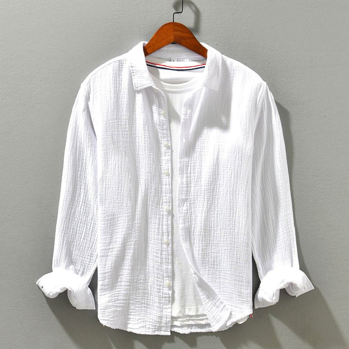 Casual men's long sleeve crinkle shirt, ideal for summer fashion, resort wear, and relaxed everyday style.