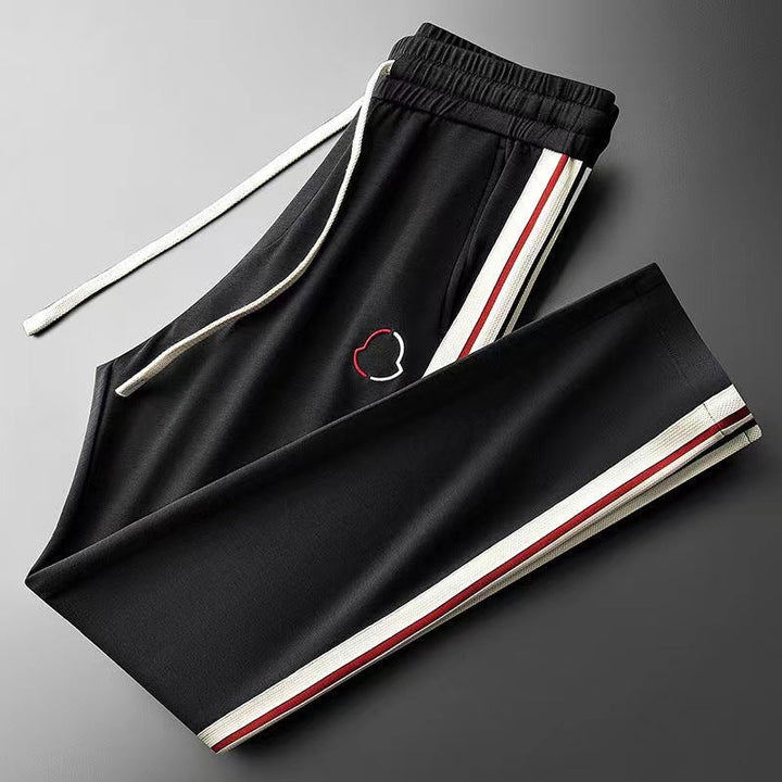 Flexible men's Aero Fit tracksuit for ultimate comfort & movement in athletic and gym activities.
