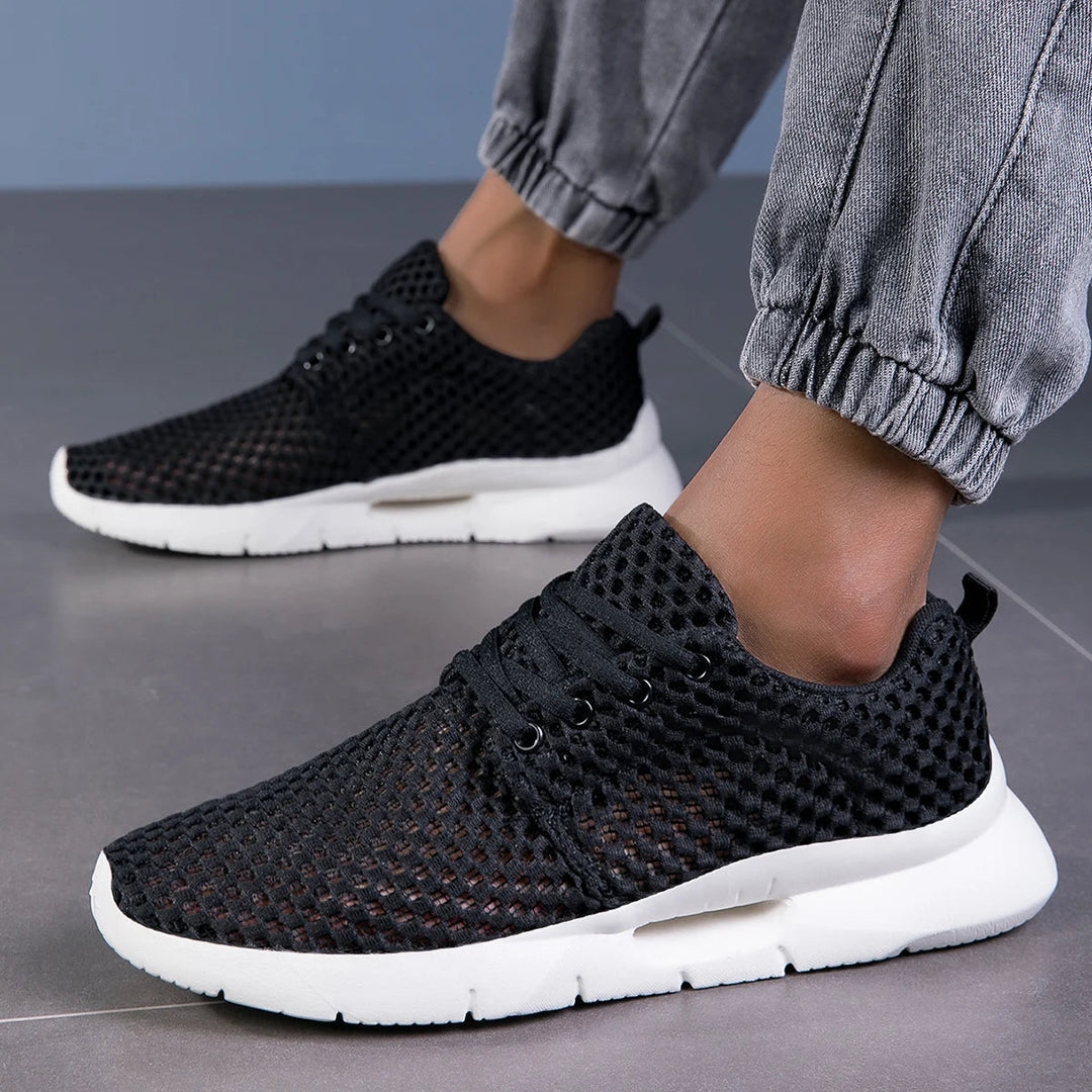 Lightweight men's breathable mesh sneakers, ideal for athletic running & walking.