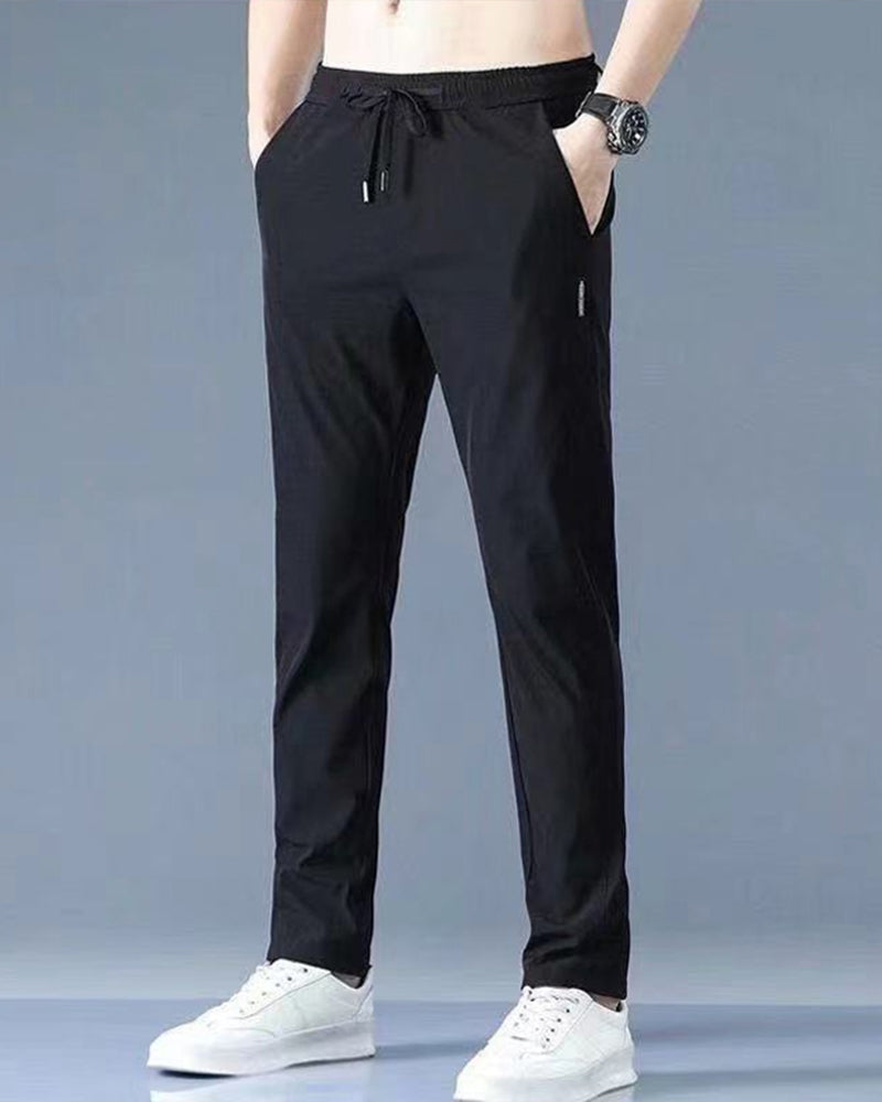 Athletic men's activewear trousers, fast-drying & flexible for hiking or casual wear.