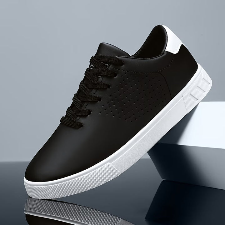 A pair of modern men's Aeron low-top sneakers, ideal everyday casual footwear with comfort & style.