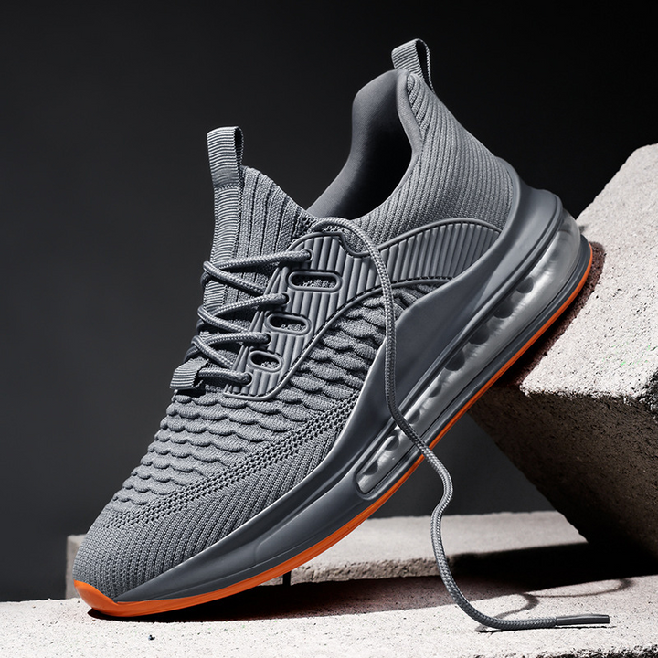 Single Men's Airvault Max running shoe, showcasing its performance features & cushioned athletic design.