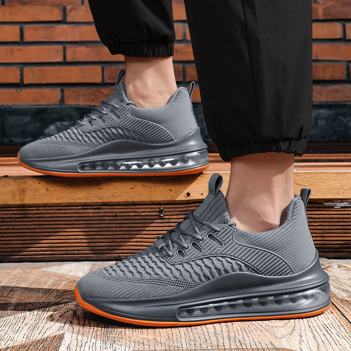 Angled shot of Men's Airvault Max athletic running shoes, engineered for performance, training & sports.