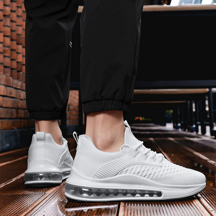 Close-up of Airvault Max performance running shoe sole, superior grip & cushioning for athletic training.