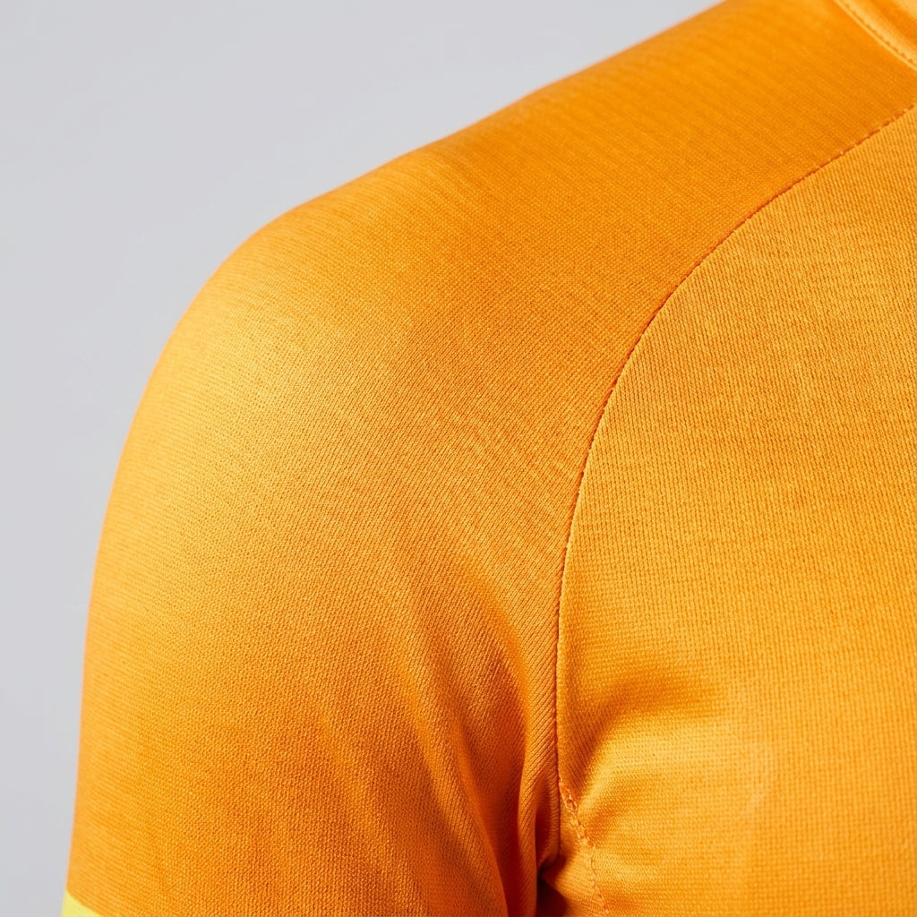 Close-up of men's aerodynamic cycling jersey fabric, Alfred, showing moisture-wicking texture