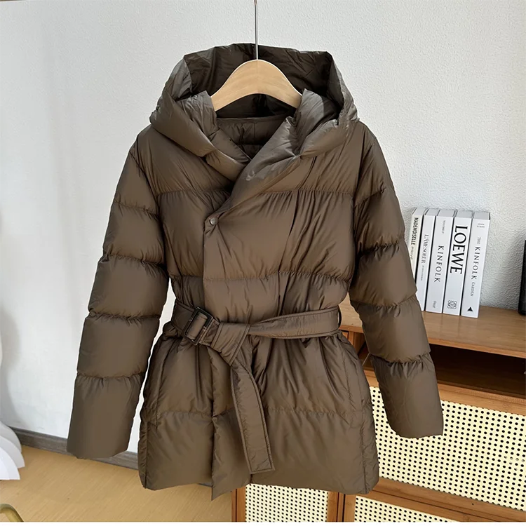 Man enjoying comfort in a gray all-season relaxed fit hooded jacket, perfect casual outerwear.