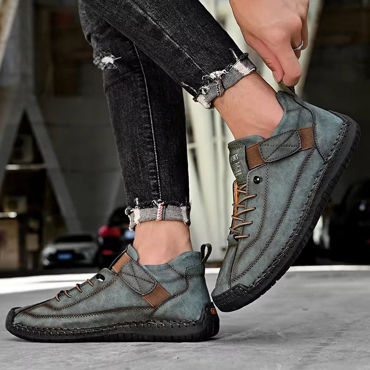 Experience ultimate comfort with men's all-terrain sneakers, featuring a strong grip sole.