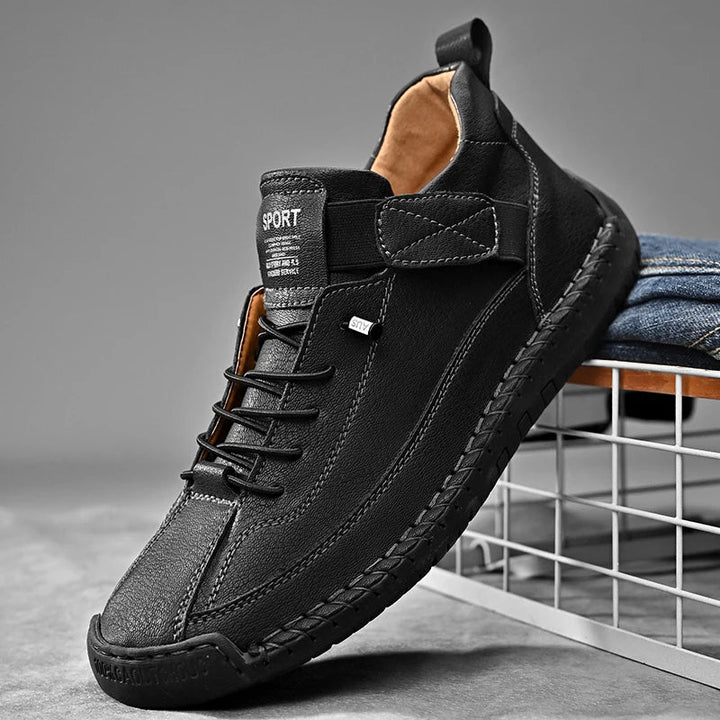 Close-up of men's all-terrain sneaker grip sole, ensuring stability on diverse surfaces.