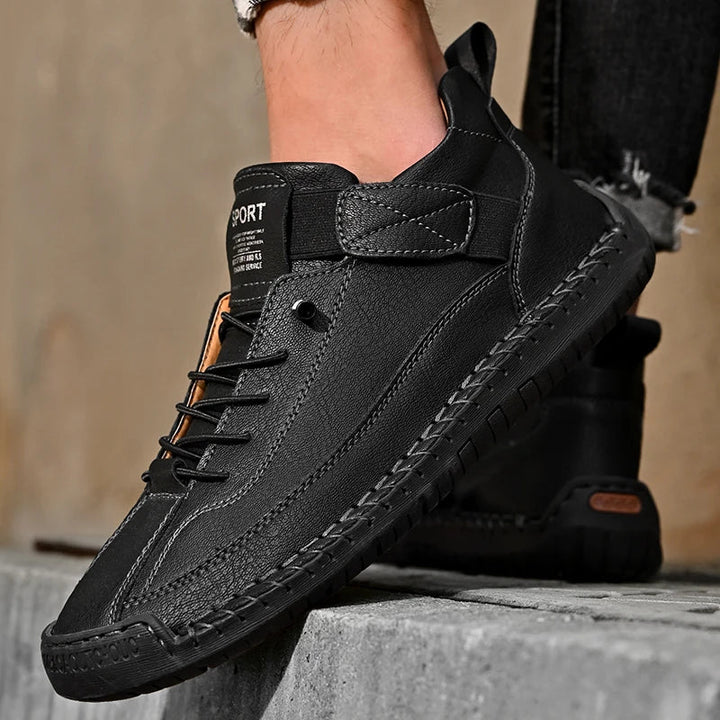 Side profile: men's stylish all-terrain sneakers, highlighting design and comfortable fit.