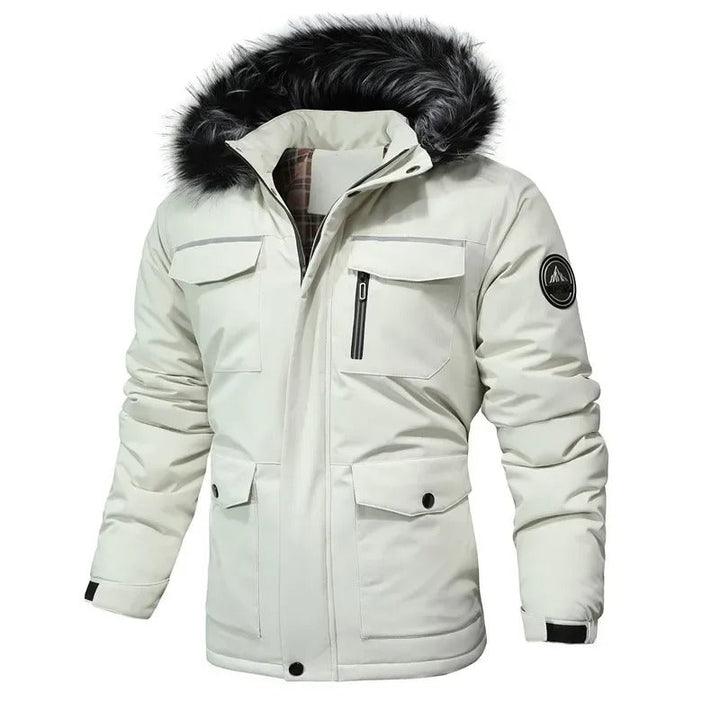 Man wearing a warm, water-resistant all-weather jacket outdoors. Perfect men's winter coat for active casual wear.