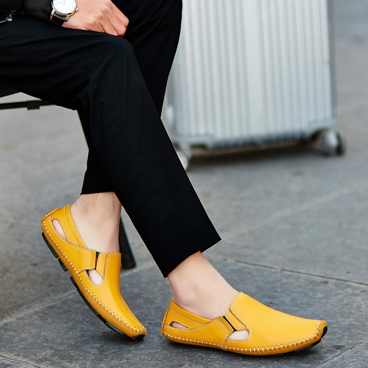 Stylish brown Amalfi men's summer shoes, open-toe design and adjustable strap for comfort.