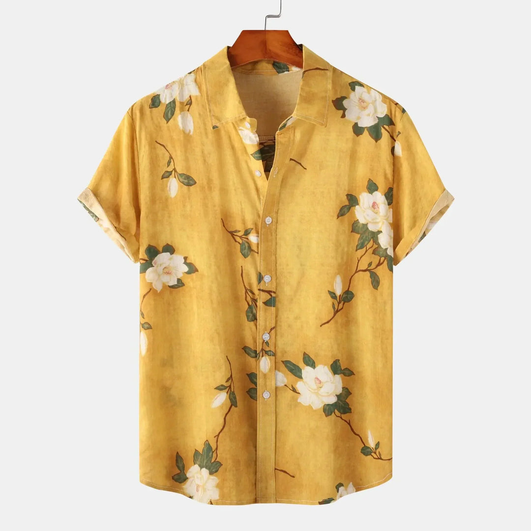 Vibrant men's floral print shirt, short sleeve & relaxed fit. Ideal Hawaiian shirt for summer vacation & beachwear.