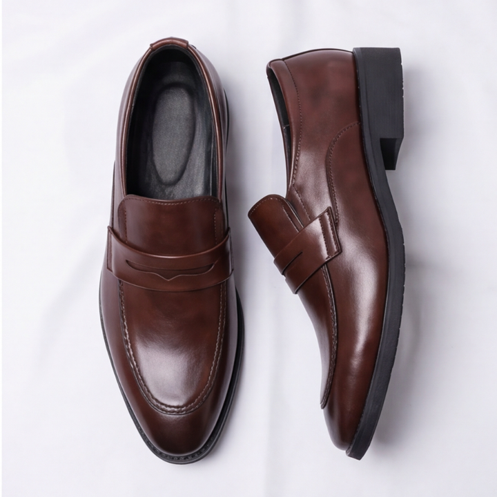 Close-up of Men's Amalfi Penny Loafers, highlighting the sophisticated leather finish and penny slot.