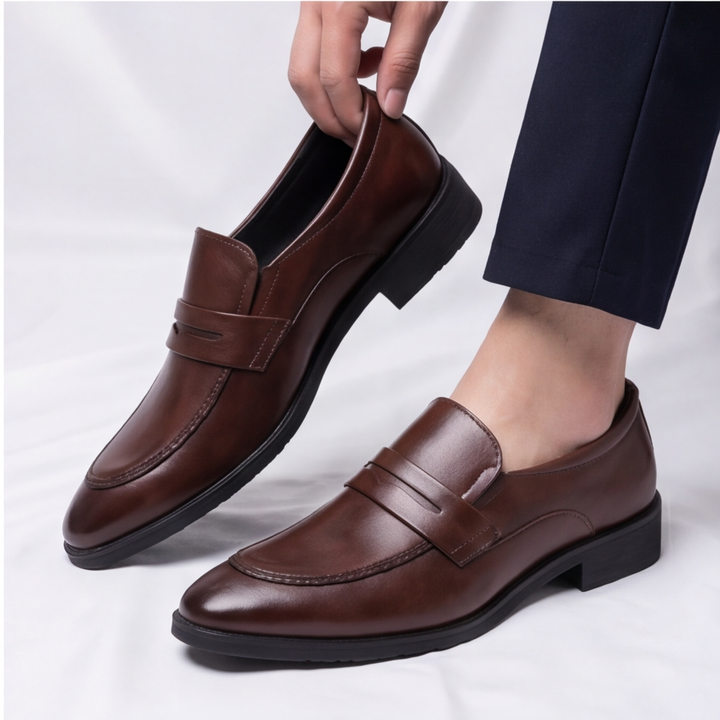 Man wearing sleek Amalfi Penny Loafers, demonstrating comfortable slip-on style for professional or casual outfits.