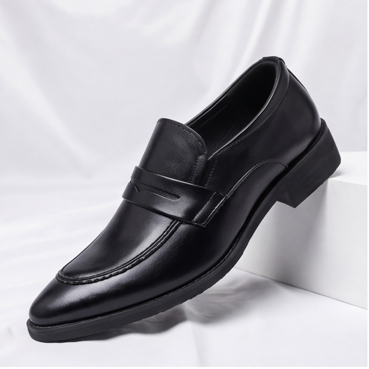 Side profile of Men's Amalfi Penny Loafers, showcasing the sleek silhouette & comfortable sole.