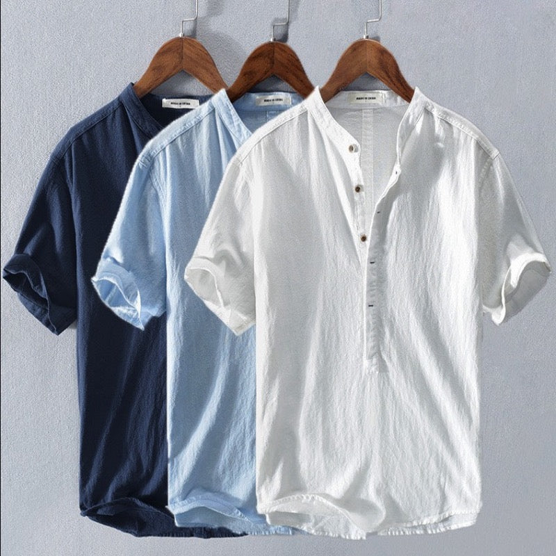 Relaxed fit men's summer henley, short sleeve, breathable for warm weather, ideal for vacation or casual wear.
