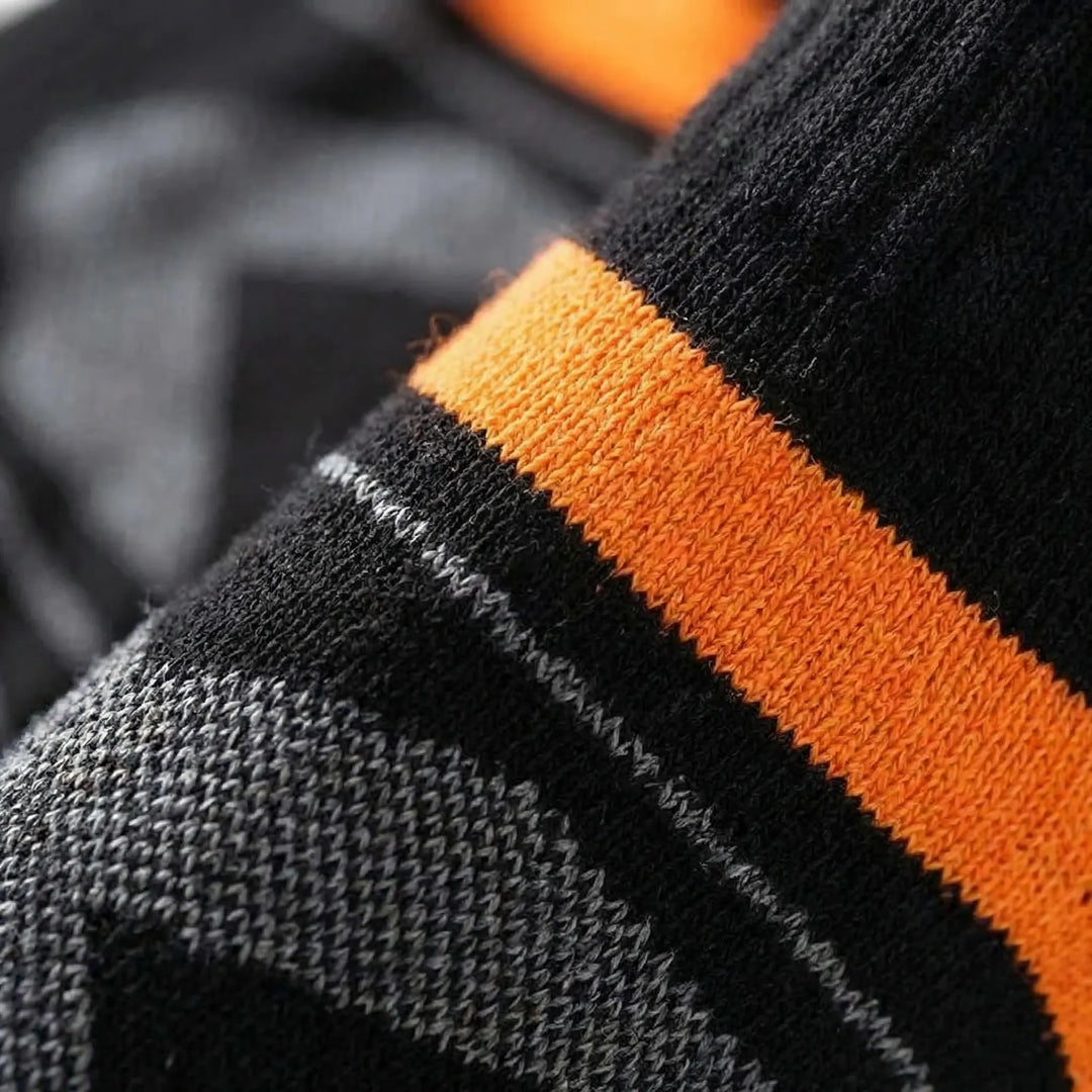 Multi-pack of men's cushioned ankle socks, perfect for athletic activities like hiking & training.