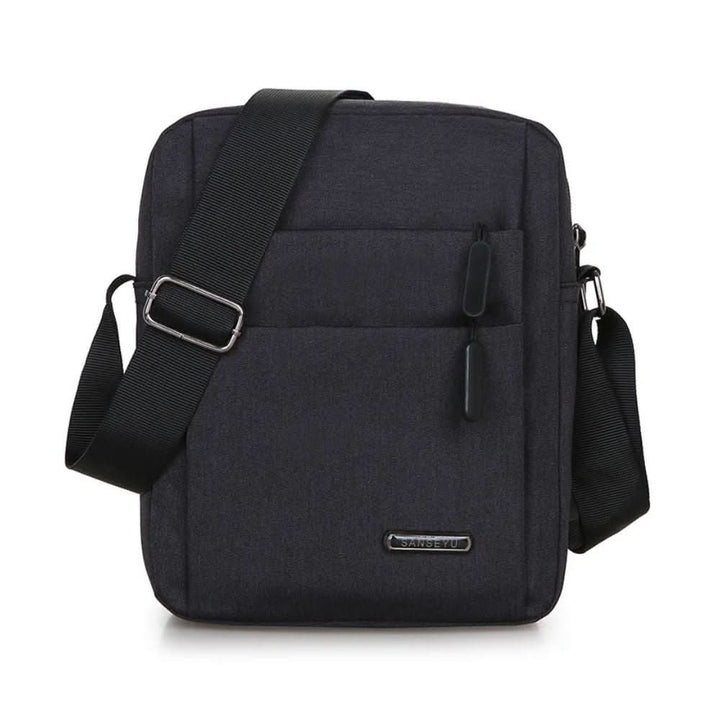 Secure black men's anti-theft cross body bag, waterproof, with hidden zippers for safe urban travel.