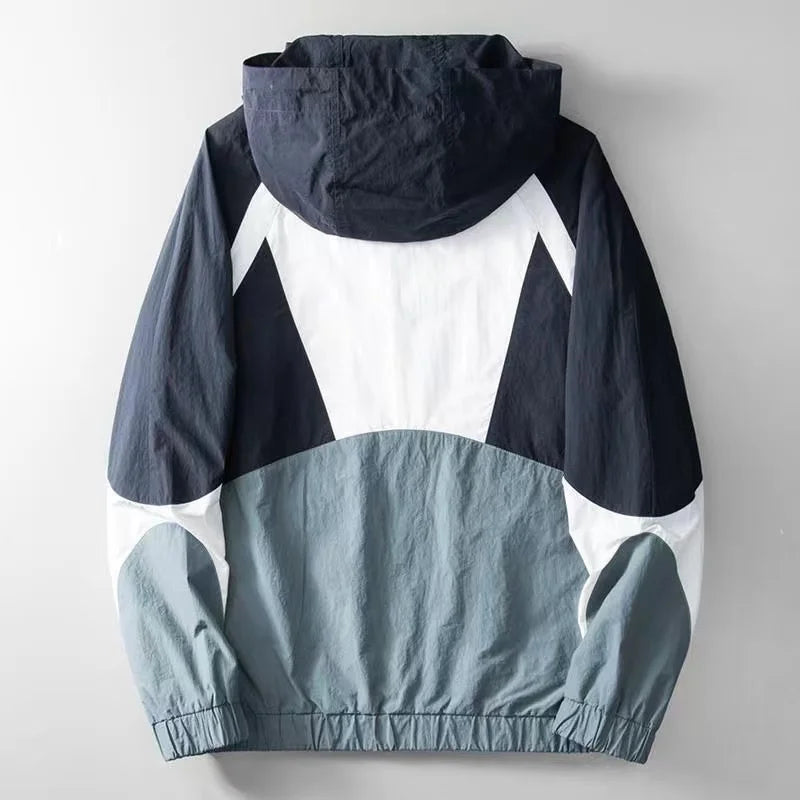 Casual men's Apex windbreaker with stylish blue & yellow color block. Lightweight, weather-ready outerwear.