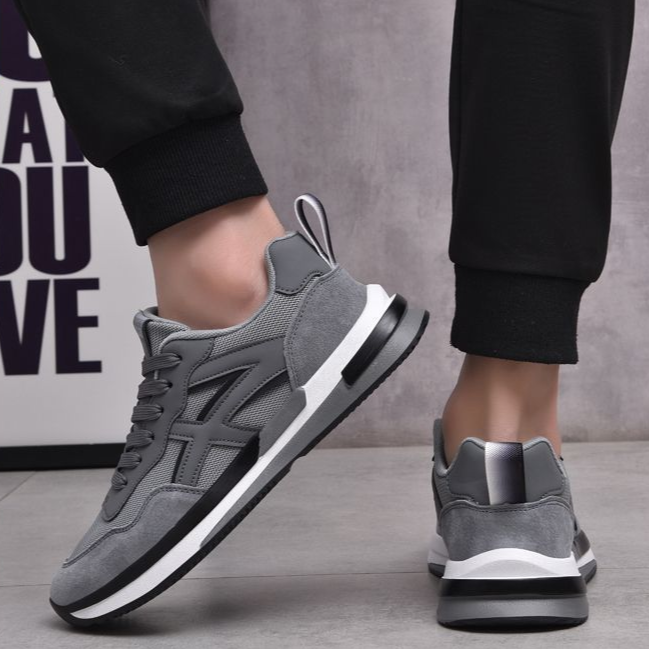 Stylish beige men's sneakers with Apollo-inspired lightweight design for ultimate comfort & casual look.