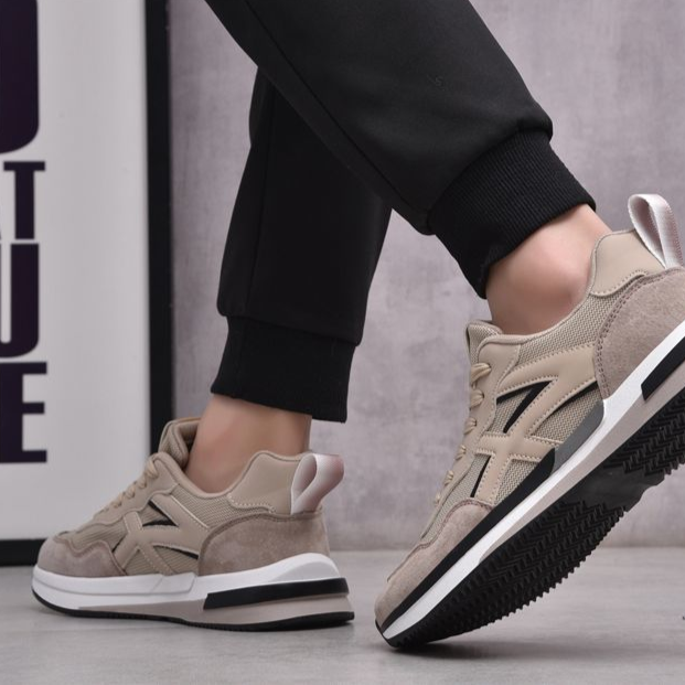Beige men's comfort sneakers, lightweight & Apollo-inspired for casual or athletic use.