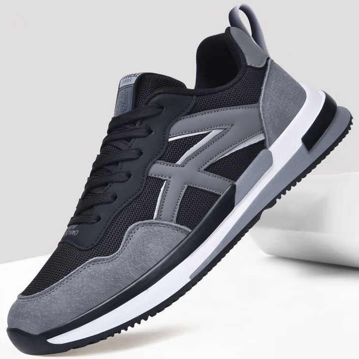 Black men's modern style sneakers, Apollo-inspired, offering lightweight comfort for everyday.