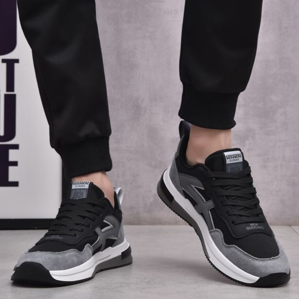 Side view of men's comfort sneakers, Apollo-inspired, showcasing lightweight design & supportive sole.