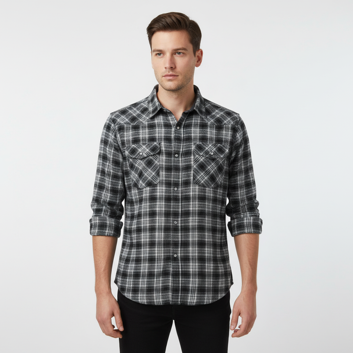 Detail of buttons & pocket on a men's checked flannel shirt, ideal winter clothing