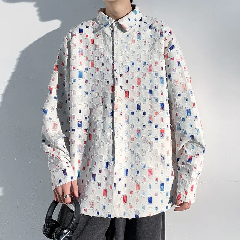 Colorful men's artisan button-up shirt with a unique textured pattern, perfect for a modern fashion statement.