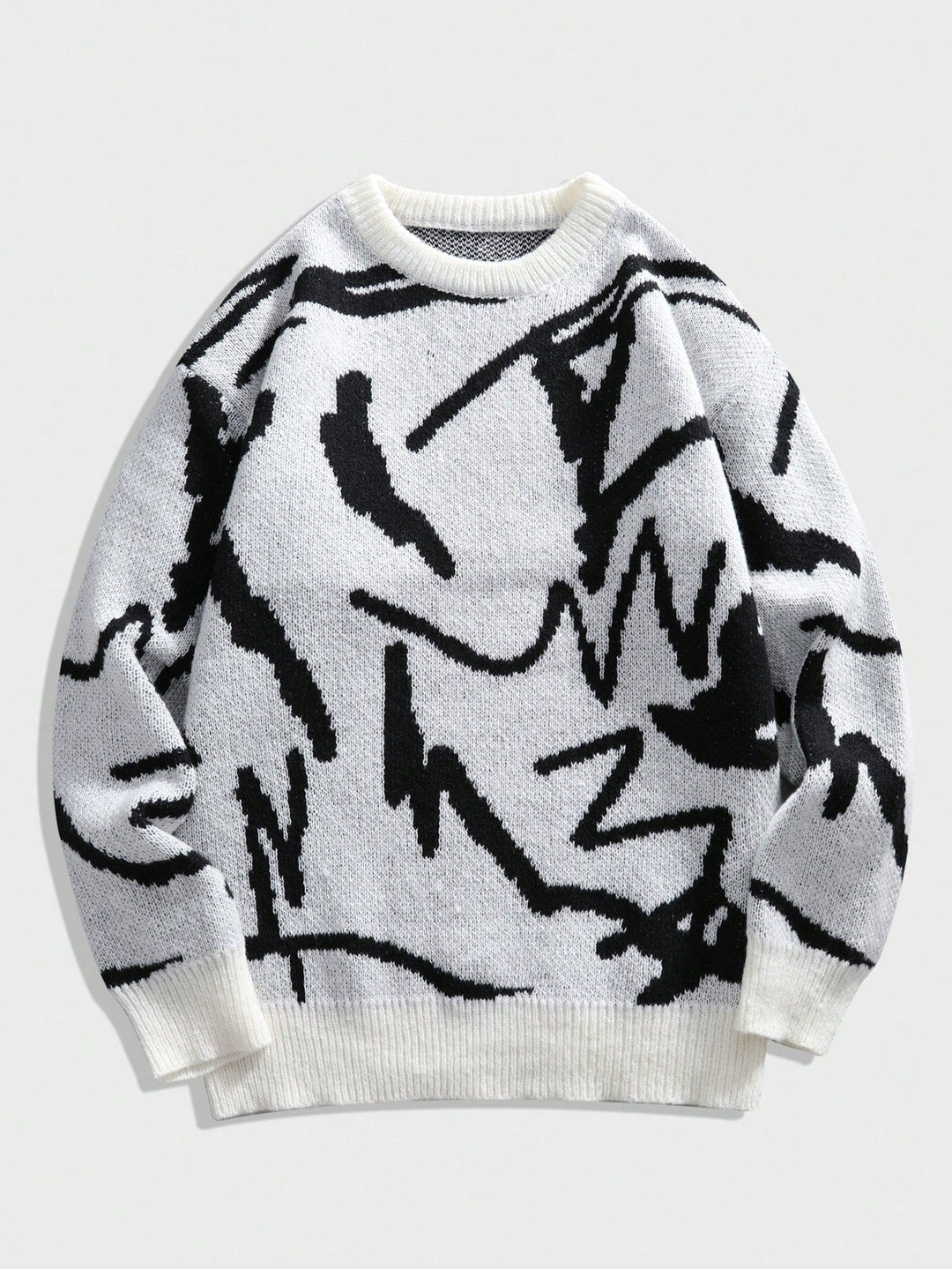 Men's Arvid graphic print sweater in a lifestyle shot, embracing trendy and comfortable autumn wear.