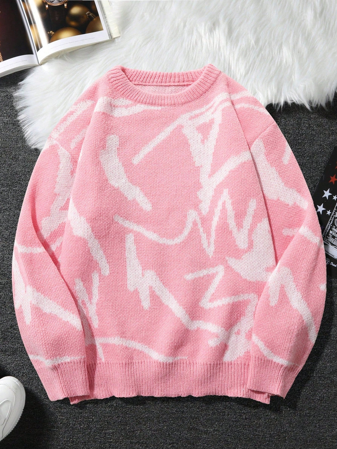 Modern men's apparel: Arvid graphic print sweater, a trendy long sleeve pullover with a relaxed fit.