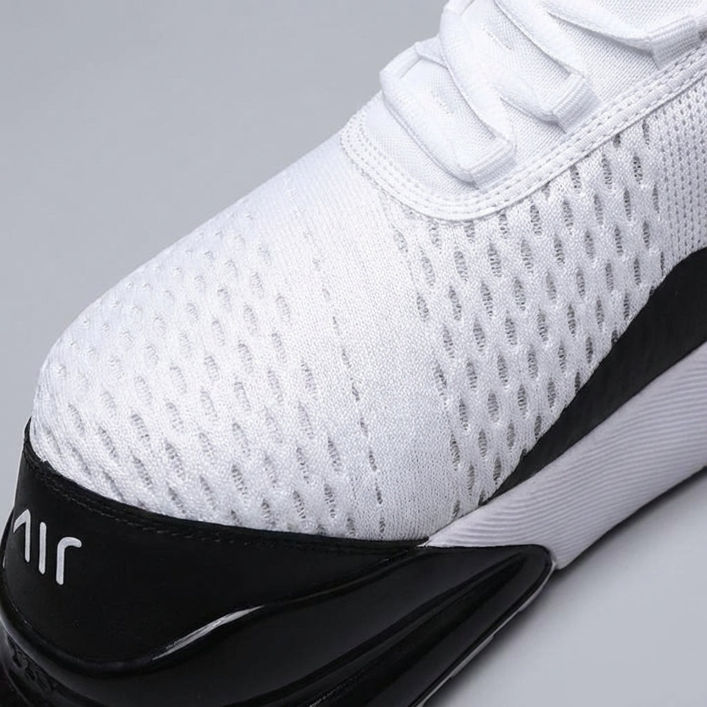 Close-up of men's athletic sneaker showing Air Cushion technology for superior comfort