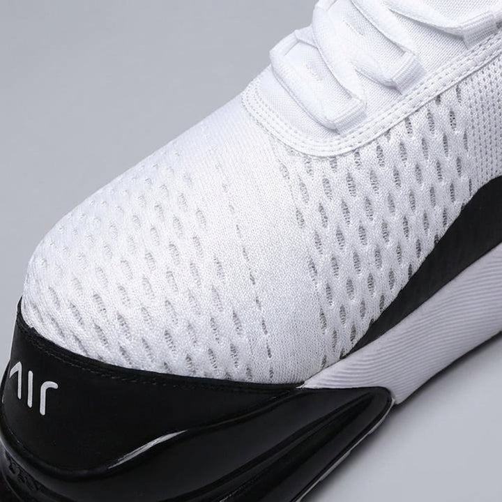 Close-up of men's athletic sneaker showing Air Cushion technology for superior comfort