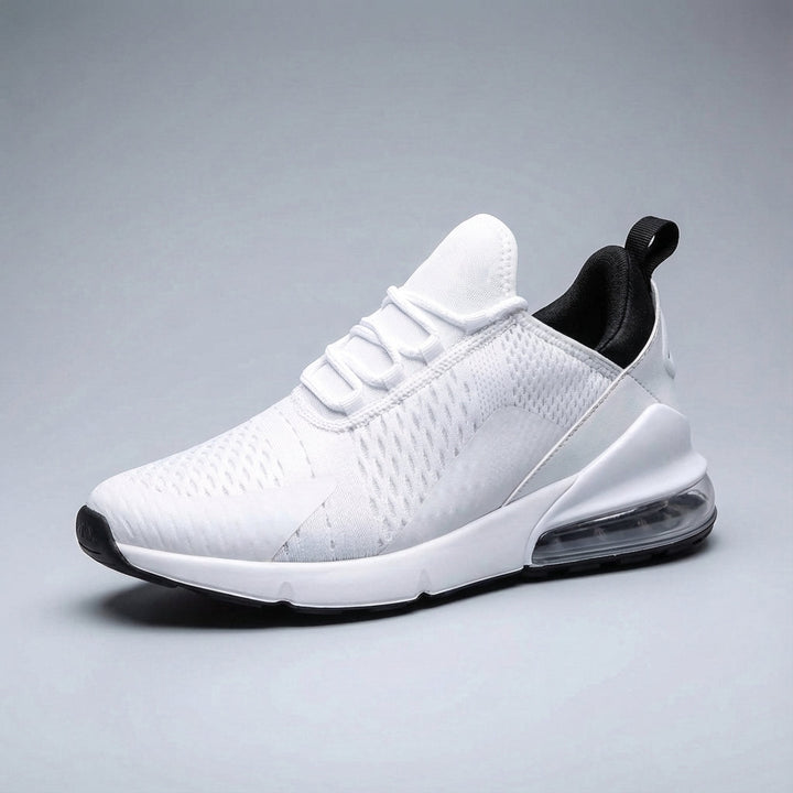 Side view of men's athletic running shoes, highlighting breathable mesh and cushion support