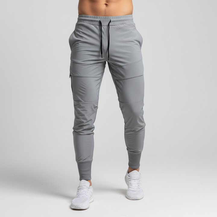 Close-up of flexible heather grey slim fit men's joggers for sportswear and training