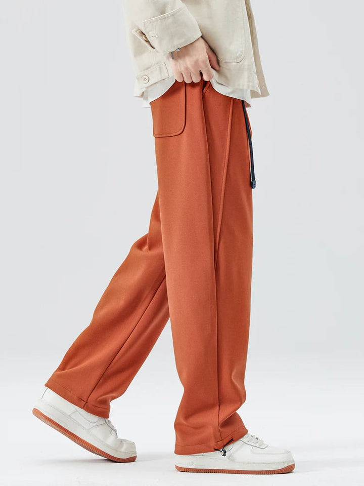 Comfortable men's wide-leg pants with adjustable drawstring waist, relaxed fit for ultimate ease.