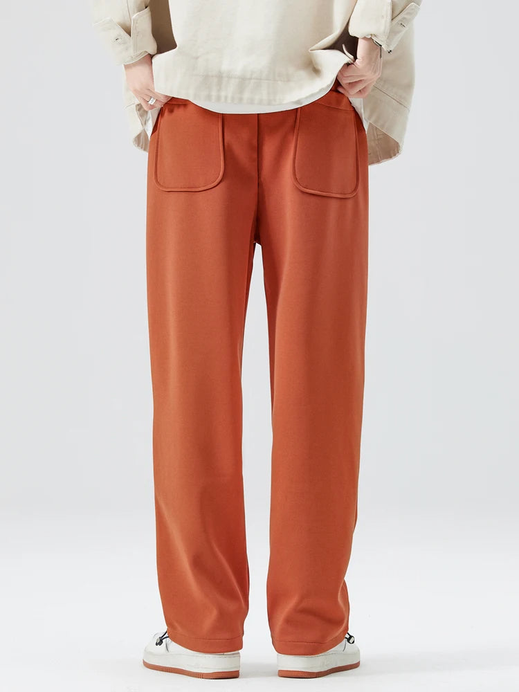 Wrinkle-resistant men's Atlas wide-leg trousers, easy care for stylish casual and everyday wear.